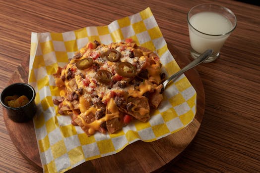 businesswoman-holding-credit-card-on-desk