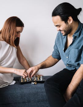 Stock photo of young adult with credit card and smartphone